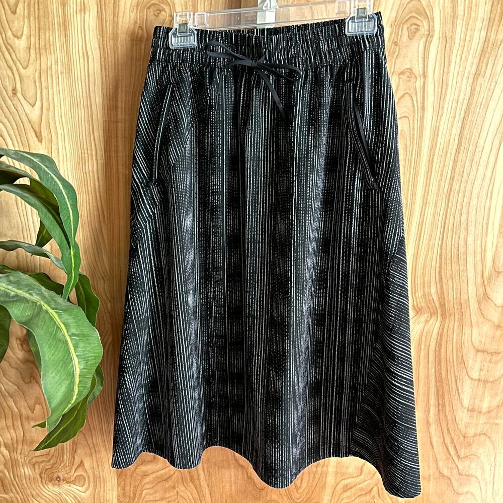 SOLD: Athleta Black A-Line Skirt With Pockets Midi Strings Womens Size 4